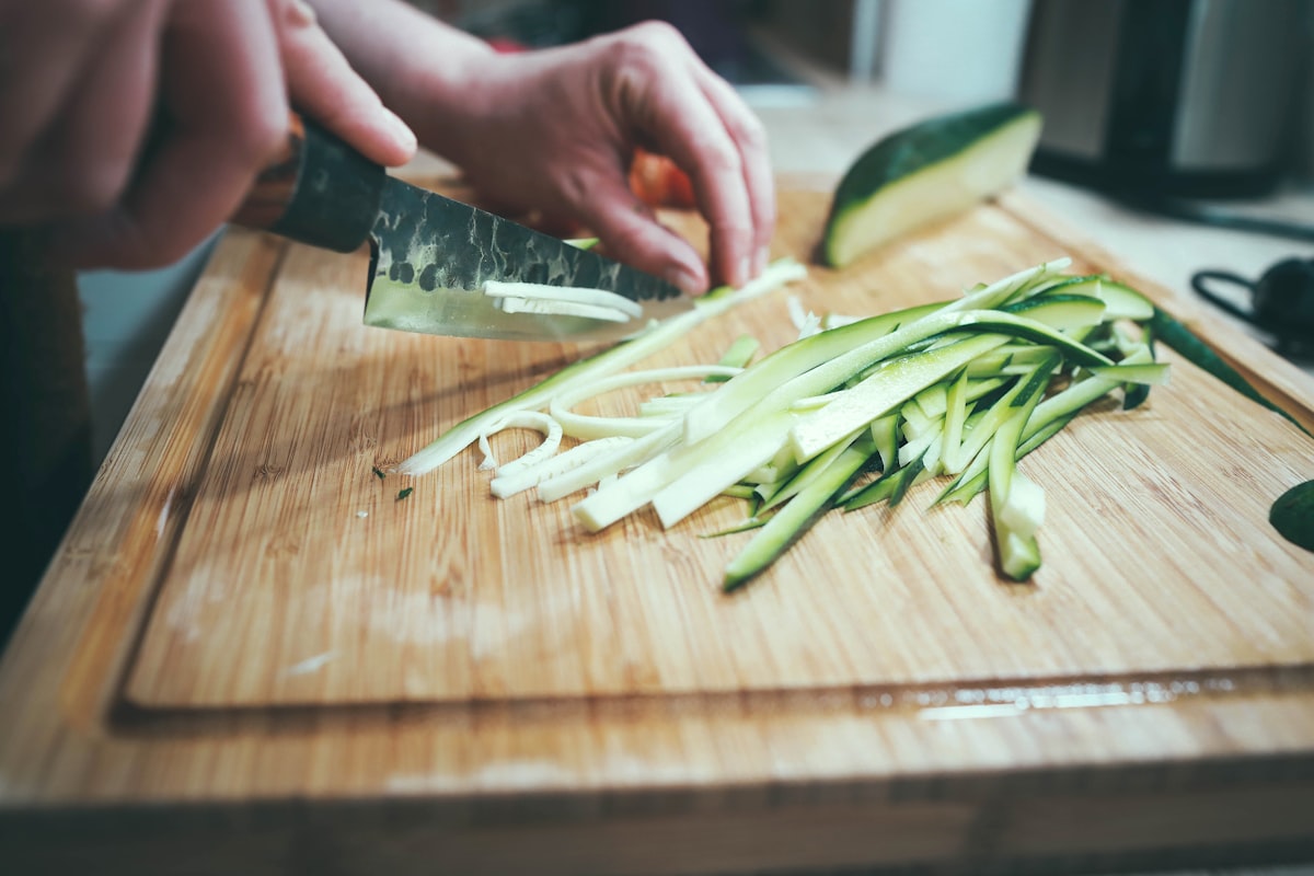 Colorful smoothie bowl topped with granola, berries, and coconut